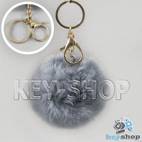Серый пушистый брелок шарик из натурального меха с кольцом и кожаным ремешком на сумку